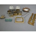 Collection of brass & white metal items to include a button cleaner, napkin rings, ashtray etc