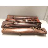 4 Leather cases possibly for geometric instruments