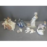 7 LLadro figures: 06470 Dolpins, 06175 Swan 06637 - Poodle, 5.212 Lady with parasol all boxed lady