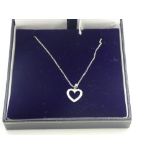 18ct White gold diamond set heart shaped pendant necklace on gold chain 25 points, cased