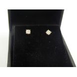 Pair of 18ct yellow gold diamond stud earrings of 30 points