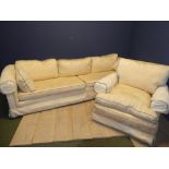 3 Seater cream upholstered sofa (63H x 257W x 91D cm) with matching armchair (81H x 94W x 81D cm)