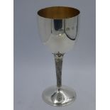 Modern designer silver wine goblet with crown collar to tapering scale stem, gilded inside bowl 17.5