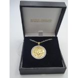 18ct Mixed yellow & white gold pendant of Medusa surrounded by diamonds