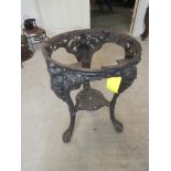 Cast iron decorated table base on tripod stand