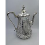 Victorian silver coffee pot with engraved panelled sides, crested & monogram cartouches, the