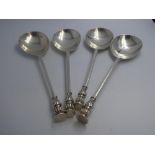Set of 4 sterling silver spoons with cast stamp finials by Cohen & Charles London 1922