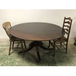 Circular Mahogany pedestal table to casters and two chairs, Table: 72cmH - 42cm diameter