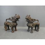 Two oriental style bronze lions with mark on the shoulder 9cmH