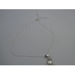 Silver magnifying glass necklace on silver chain with owl finial