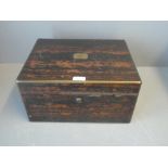 A good quality coromandel writing box fitted with two drawers and satin wood lining by Newman and