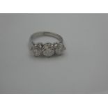 18ct White gold 3 stone substantial diamond ring of 3.22 cts size K approx clarity I II