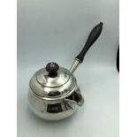 Early Victorian Irish silver saucepan with side spout & turned evony handle, engraved crest with