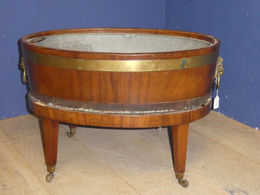 George III brass bound oval wine cooler with liner 48H x 75L x 48.5D cm (as found)