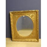 Large gilt framed oval mirror c1870 88H x 78W cm