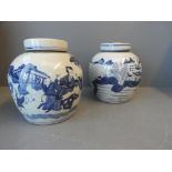 Pair of Lidded ginger jars decorated in blue & white Oriental style 25H x 25W cm
