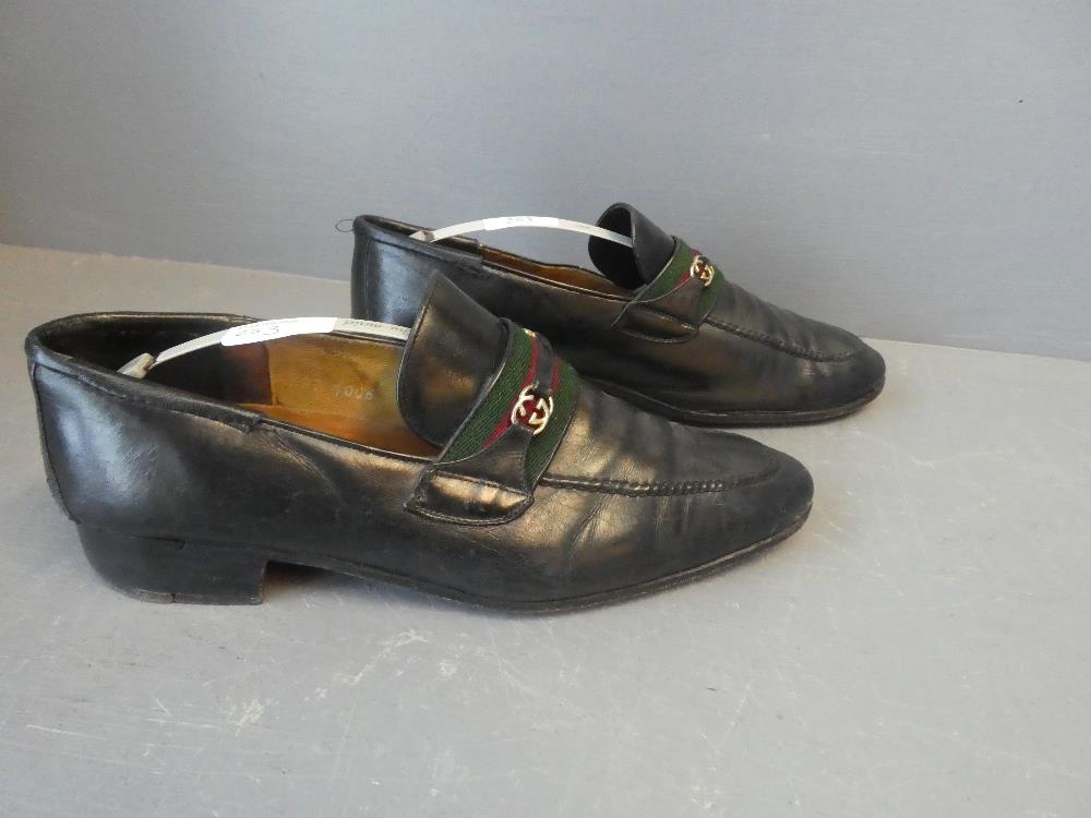 Pair of gents black leather GUCCI loafers with GUCCI red & green web stripe & GUCCI strap size 42