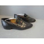 Pair of gents black leather GUCCI loafers with GUCCI red & green web stripe & GUCCI strap size 42