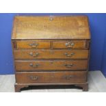 Writing bureau of 2 short over 3 long grasuated drawers 108H x 105W x 50D cm