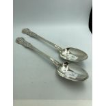 Pair of William IV silver Queens pattern basting spoons engraved with stags head crest by John J