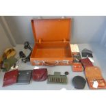 Small brown leather attache case containing leather and other cartridge holders and game shooting