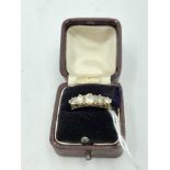 18ct gold & diamond 5 stone ring , graduated line of old cut diamonds in an open work setting size G