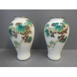 Pair of cloisonne vases decorated with grapes and leaves 18.5H x 11W cm