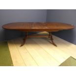 Modern reproduction twin pedestal dining table with central additional leaf