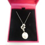 White gold diamond & cultured pearl pendant necklace on a gold chain