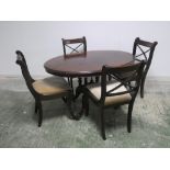Oval shaped dining table with set of dining chairs with 4 cross stretchers