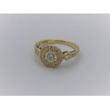 Impressive 18ct yellow gold diamond cluster ring of 1.1cts total, size L1/2