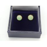 Pair of yellow gold jade stud earrings