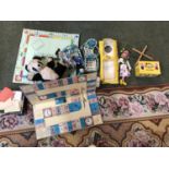 Two Pelham Puppetts, and other toys to include Monopoly, panda, china doll etc