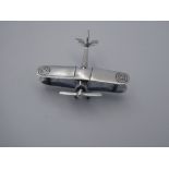 Silver figure of a Bi Plane