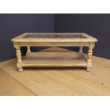 Contemporary painted 2 tier coffee table with glass top 94L x 56W cm