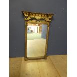 An Empire Recency rectangular gilt wall mirror with 2 decorative lion heads
