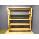 Vintage & decorative freestanding shelf unit raised on industrial wheels 1.8L x 45 D 1.9H