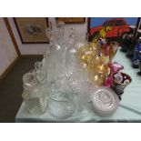 Quantity of glassware including jugs, decanters, bowls and brandy balloons, and a bohemian ruby