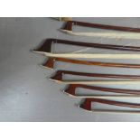 Selection of violin and double bass bows