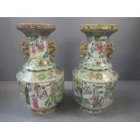 Pair Chinese famille rose vases with scenes of domesicity &dogs of fo gilt handles, 34cm H, 1