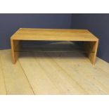 Contemporary coffee table with glass shelves under 120L x 60H cm