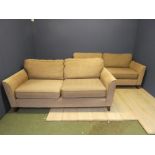 Pair of modern sofas, upholstered in a contemporary brown fabric