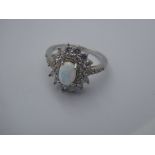 Silver & cubic zirconia ring set with opalite size R
