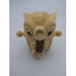 Unusual bone tape measure in the form of an owl