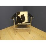 Contemporary chrome & cow hide chair