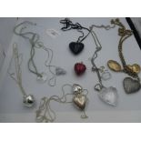 Collection of white metal heart pendants & chains