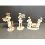 Royal Worcester pair of Victorian/early C20th figures carrying baskets & a matching figure of