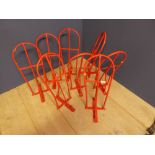 Qty of red saddle racks