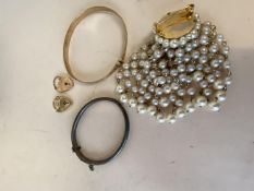 Two hallmarked gold heart lockets, a gold christening bracelet, and a hallmarked silver hinged
