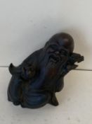 Chinese Bronze of a seated bearded man 17cm H seal mark to back CONDITION: General wear